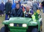 Tony Temple hitches a lift on the Big Green Machine driven by Gordon.

Yeovil Festival of Transport 2001, 11-Aug-2001.