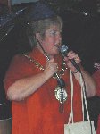 In spite of the weather, the Mayor of Yeovil starts the proceedings.

Fete at Sydney Gardens, Yeovil, 18-Aug-2001