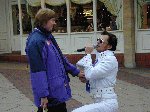 Elvis pounces on an unsuspecting passer by.

Children In Need - Quedam Yeovil, 16-Nov-2001