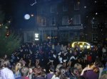 The Silhouetes make an entrance and then entertain the crowd.  Is that a nuclear-powered car in the background ???

Switching on of the Christmas lights, Crewkerne, 30-Nov-2001 