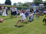 The mens entry in the tug-of-war.  Believe it or not that's an elephant on the end of the rope!!!

YDR FM Roadshow at Tall Trees School, Ilchester - Jun-2002