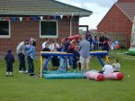 The kids get down to some serious jousting...

YDR FM Roadshow at Tall Trees School, Ilchester - Jun-2002